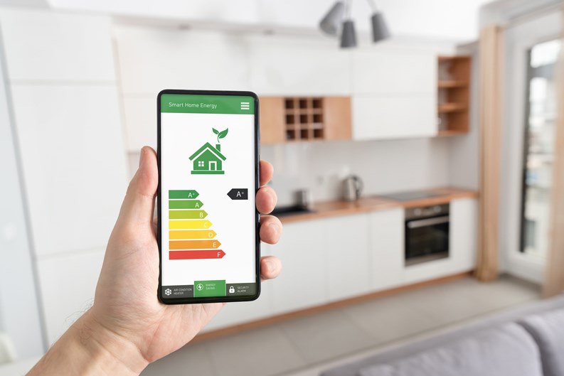 Energy efficiency mobile app on screen. Ecology, eco house concept