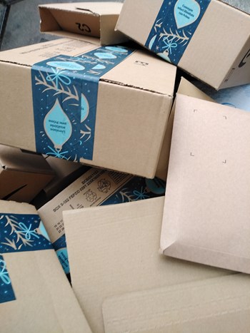 Berlin, Germany - November 22, 2019: Heap of Amazon cardboard boxes. An Amazon online retailer shipping box featuring Amazon Prime packaging tape